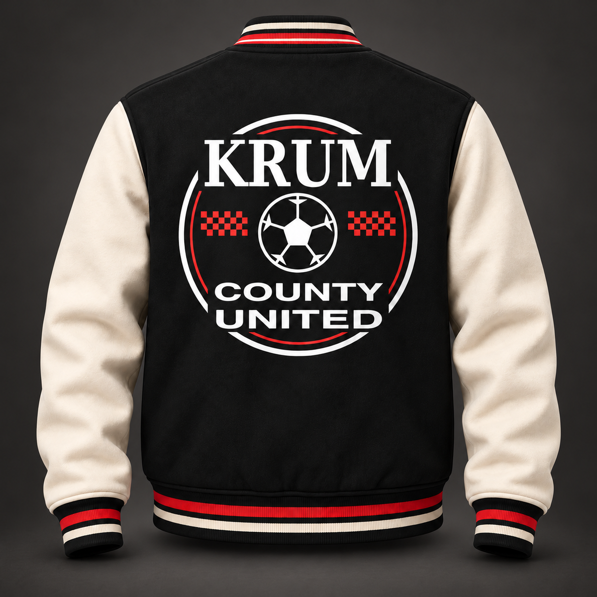 Back of the black and cream Krum County United varsity jacket with a large white and red soccer roundel.