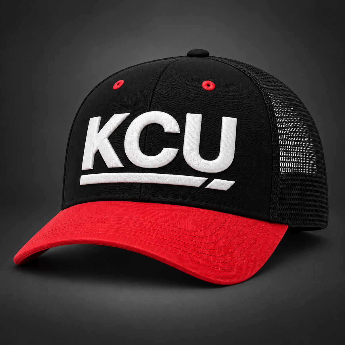Black and red Krum County United trucker cap with raised white KCU embroidery and a curved red bill.