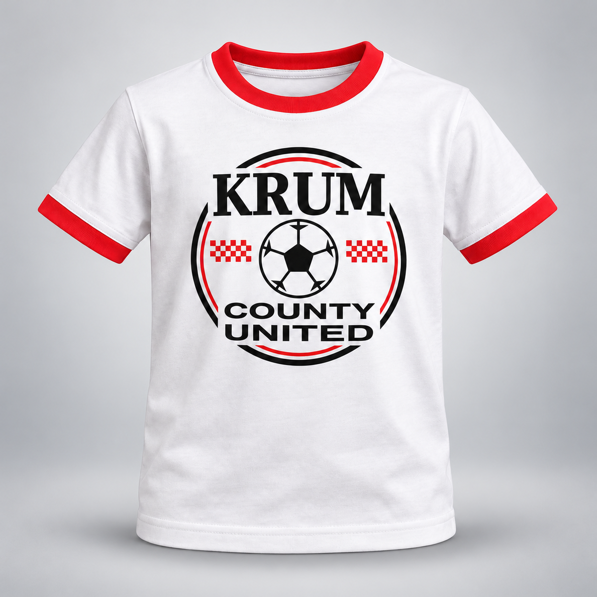White youth Krum County United ringer tee with red trim and a black and red soccer roundel.